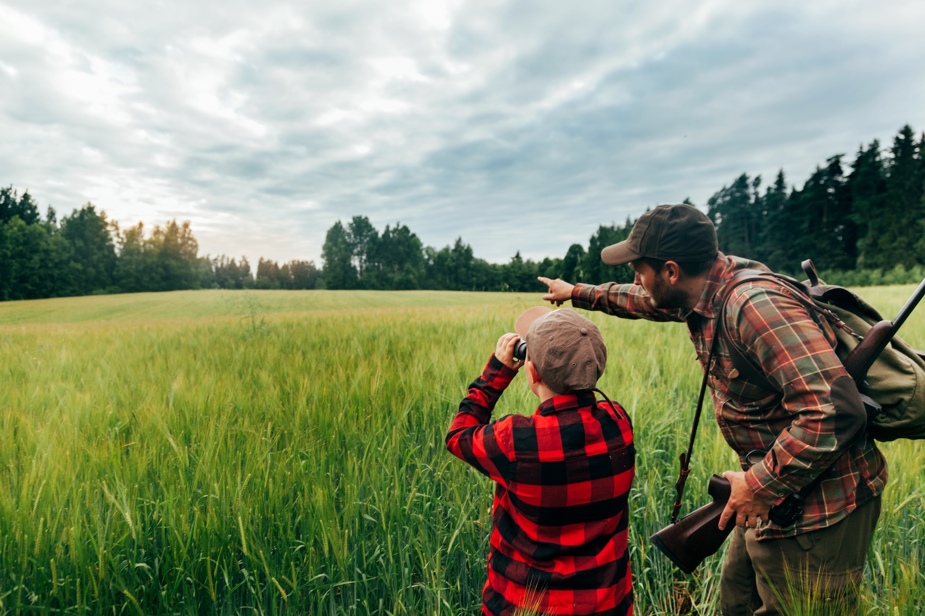 Father and Son hunting for boar