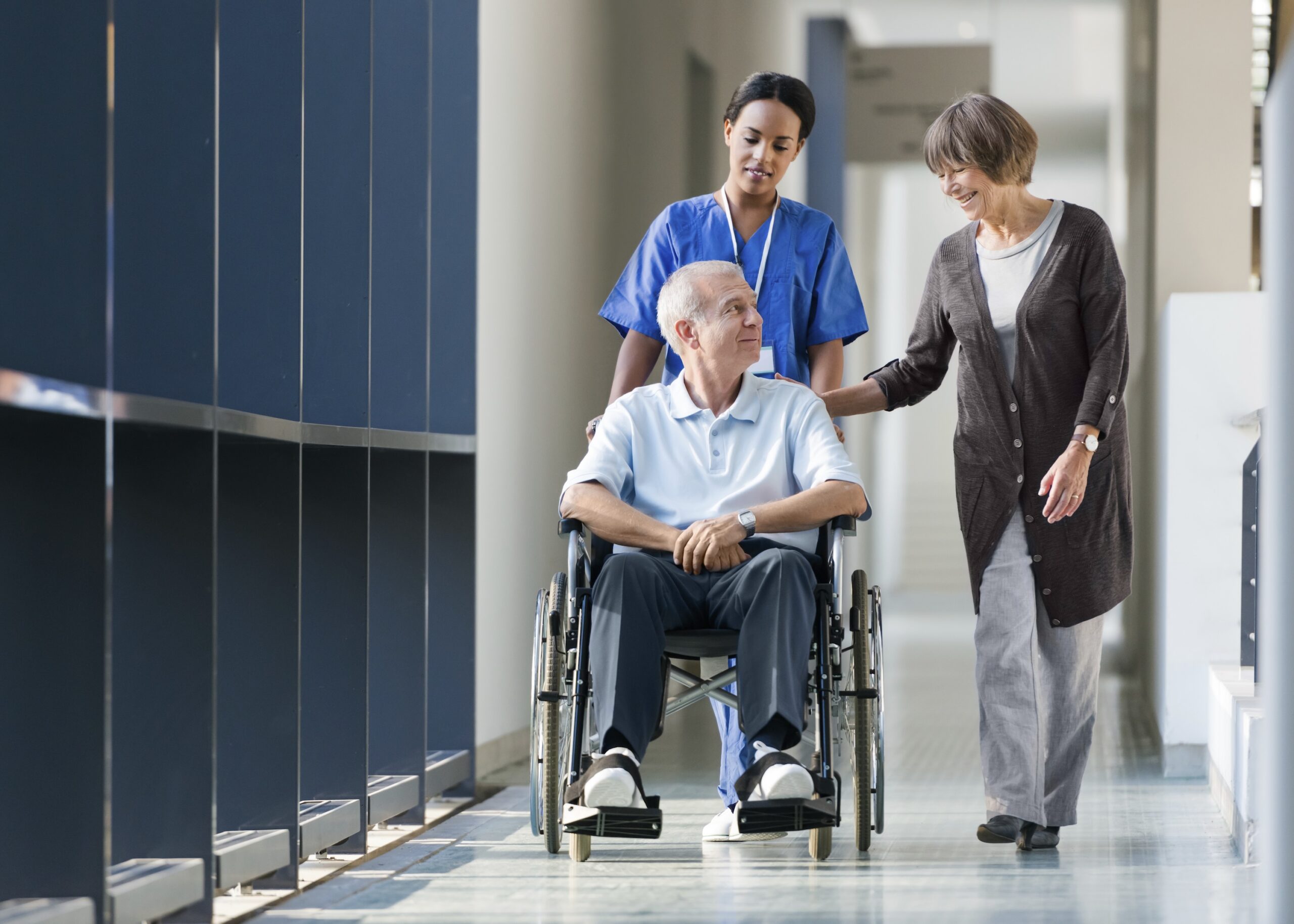 Patient in wheelchair around hospital